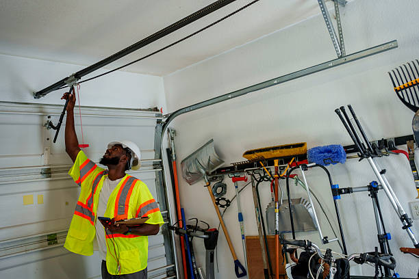 Professional Garage Door Panel Replacement technician working in Rawls Springs, MS
